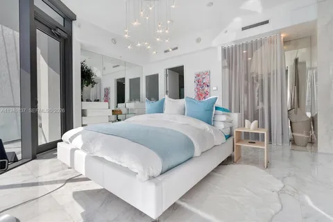 a bathroom with a double vanity sink mirror and toilet