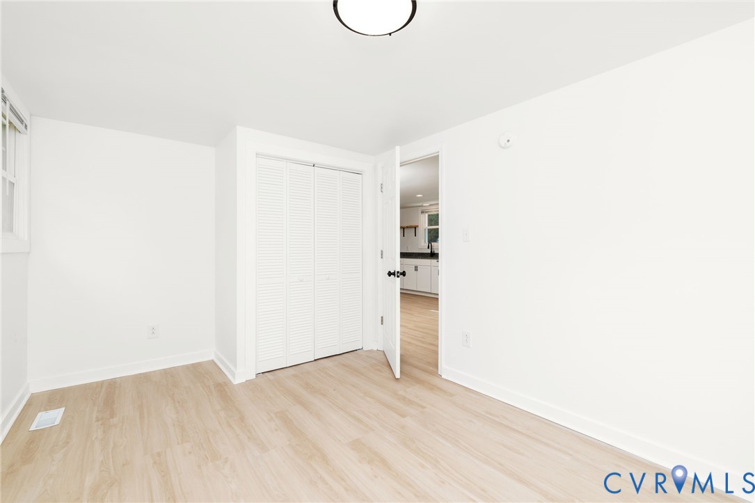 27523 Flank Road Petersburg, VA 23805 - Photo 18 of 34 Bright interior space featuring light wood-finish