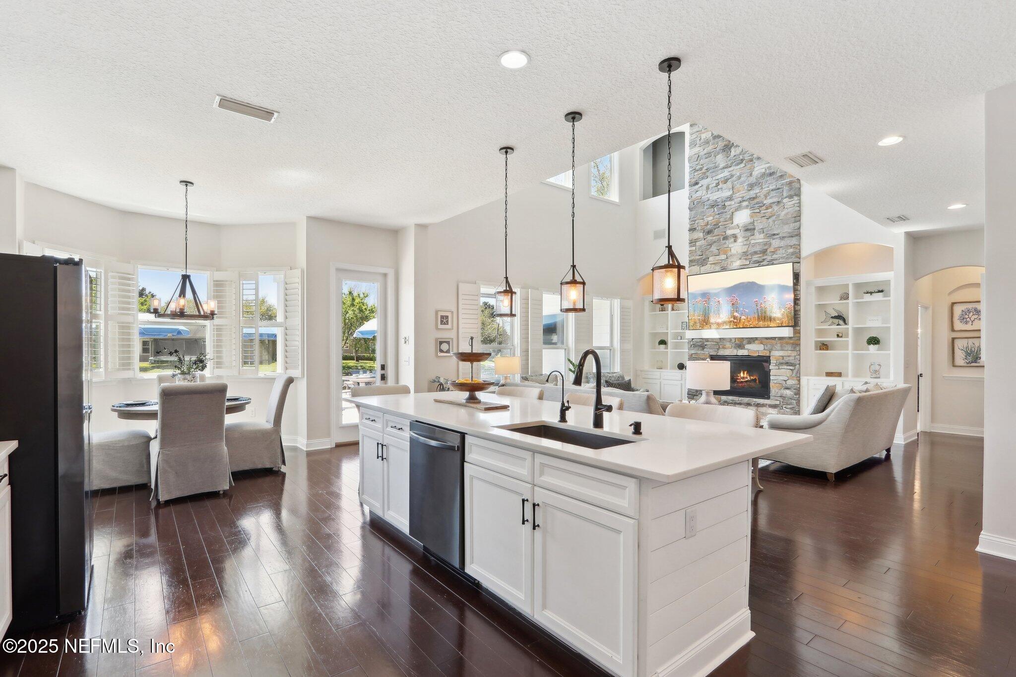 212 Cornwall Drive Ponte Vedra, FL 32081 - Photo 18 of 84 a view of living room with furniture and floor to ceiling window