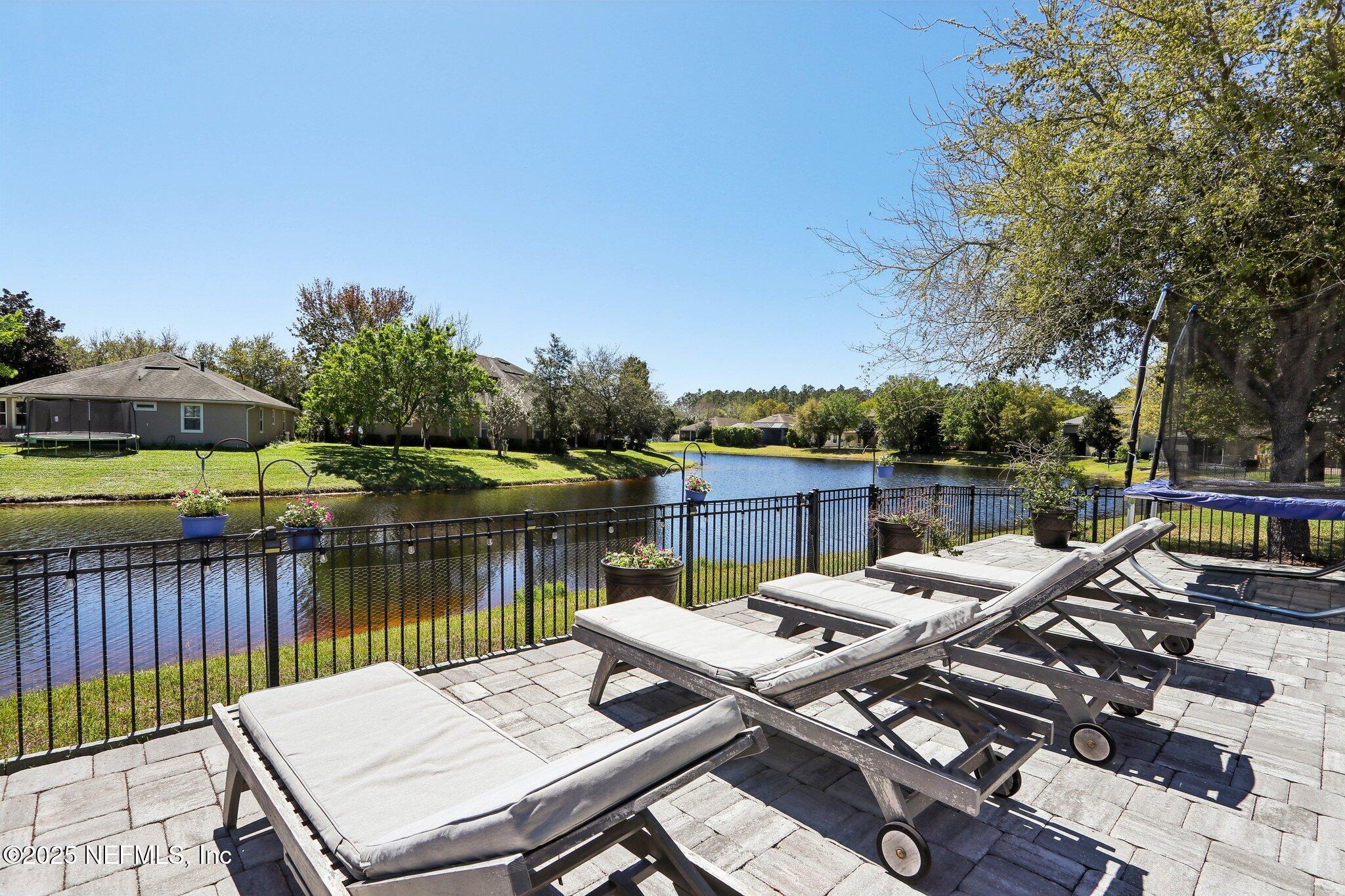 212 Cornwall Drive Ponte Vedra, FL 32081 - Photo 60 of 84 a view of a lake with furniture