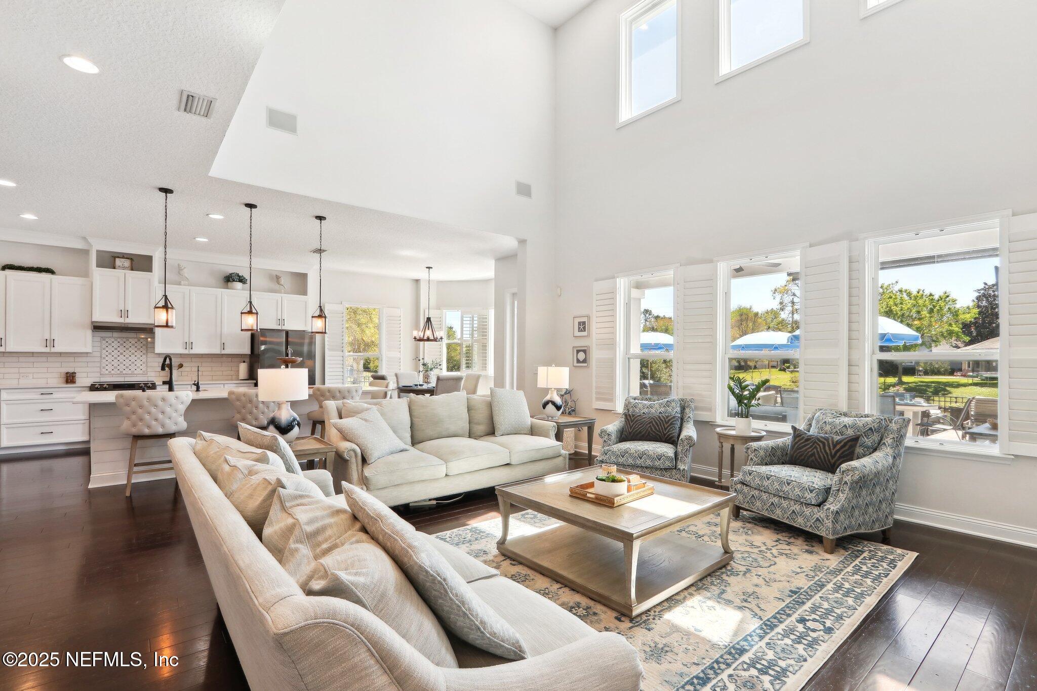 212 Cornwall Drive Ponte Vedra, FL 32081 - Photo 9 of 84 a living room with lots of furniture and a large window