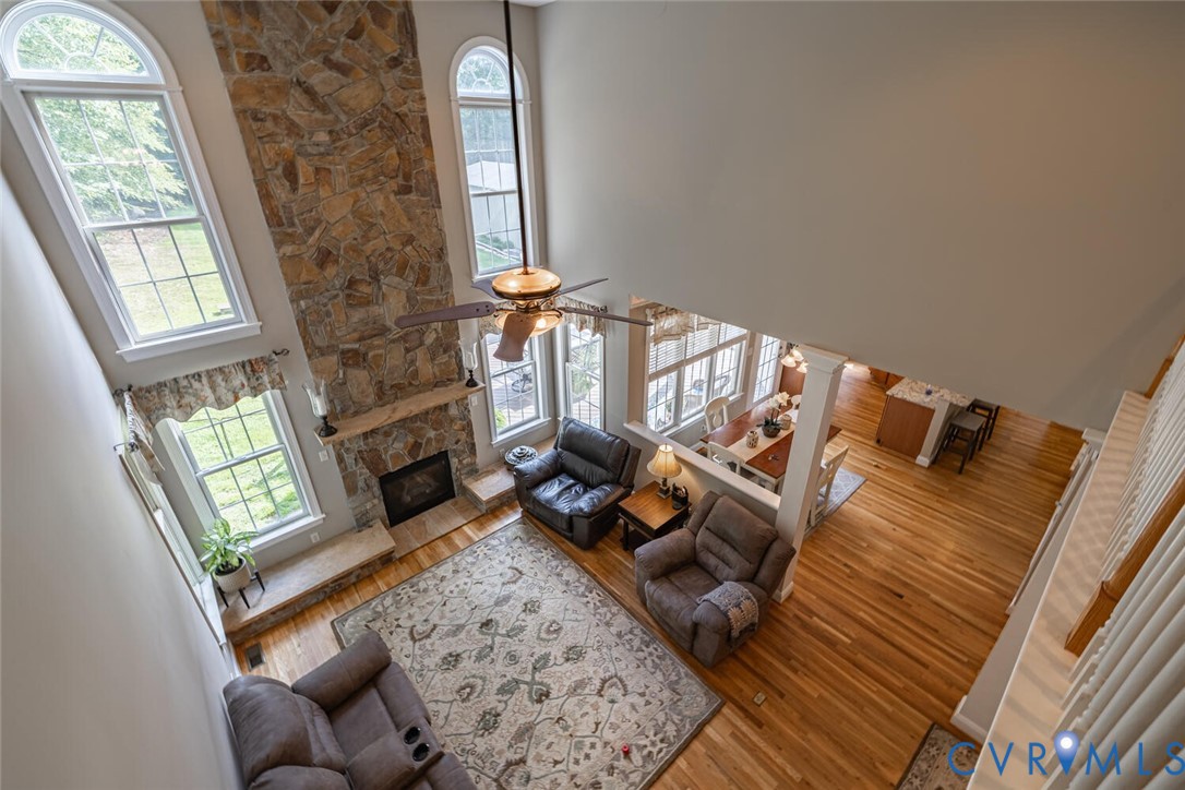 15021 River Road Chesterfield, VA 23838 - Photo 20 of 50 a living room with furniture and a fireplace