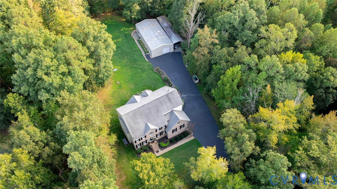 15021 River Road Chesterfield, VA 23838 - Photo 47 of 50 an aerial view of a house with garden space and sitting space