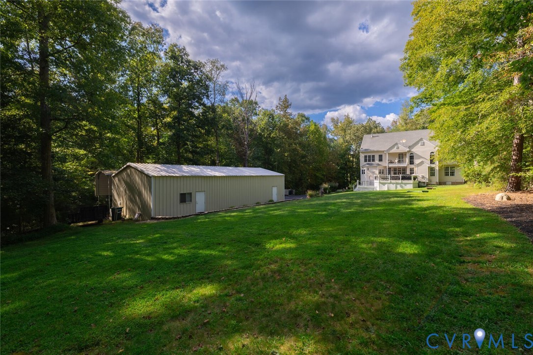 15021 River Road Chesterfield, VA 23838 - Photo 48 of 50 a view of a house with a yard