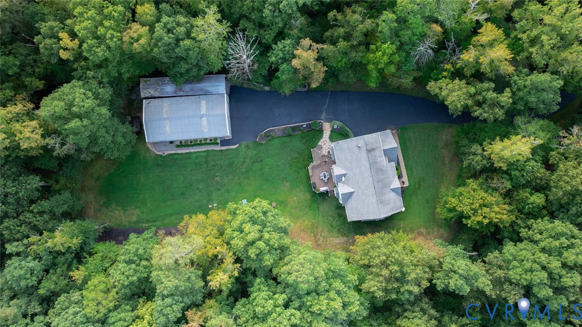 15021 River Road Chesterfield, VA 23838 - Photo 49 of 50 an aerial view of a house with a yard and lake view