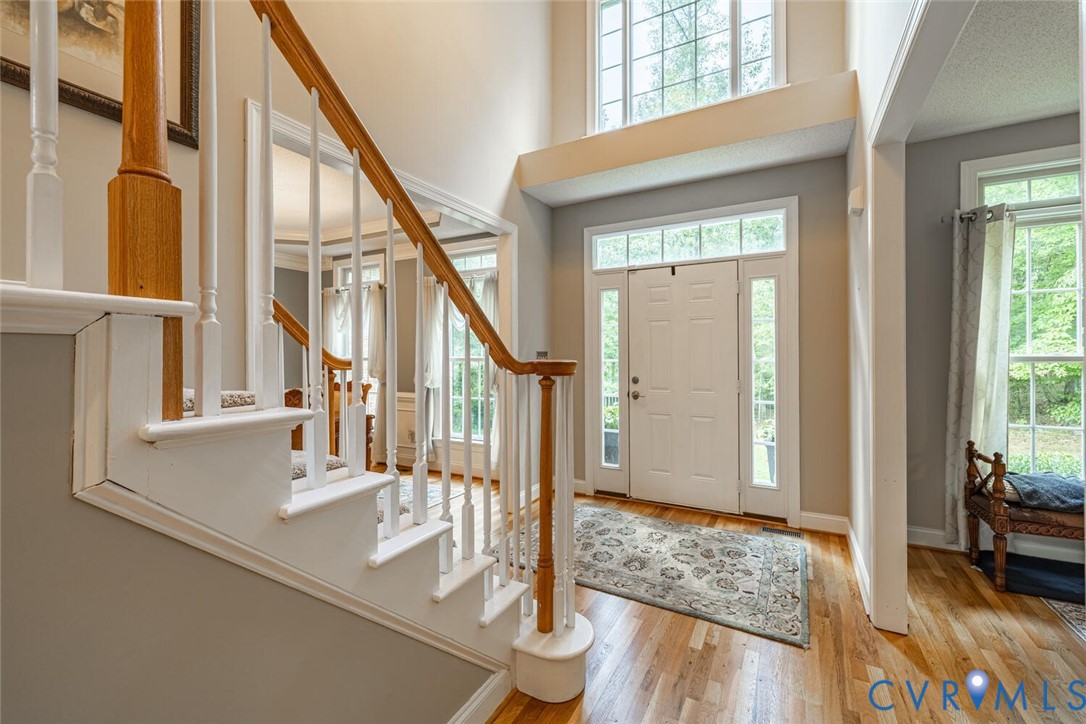15021 River Road Chesterfield, VA 23838 - Photo 7 of 50 a view of an entryway with wooden floor and door