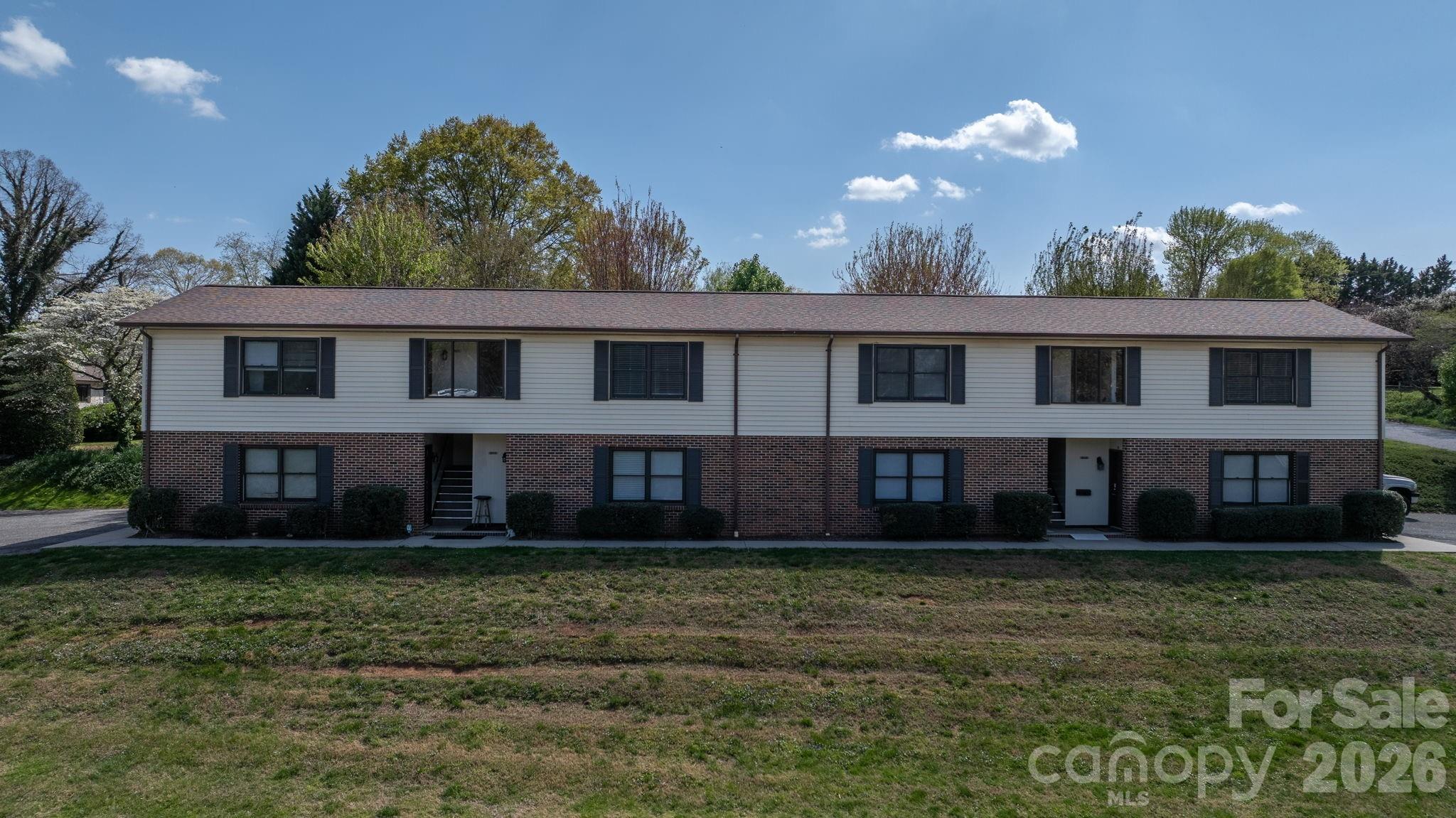 525 12th Street Southwest, Unit 26 Hickory, NC 28602 - Photo 18 of 21 a front view of a house with garden