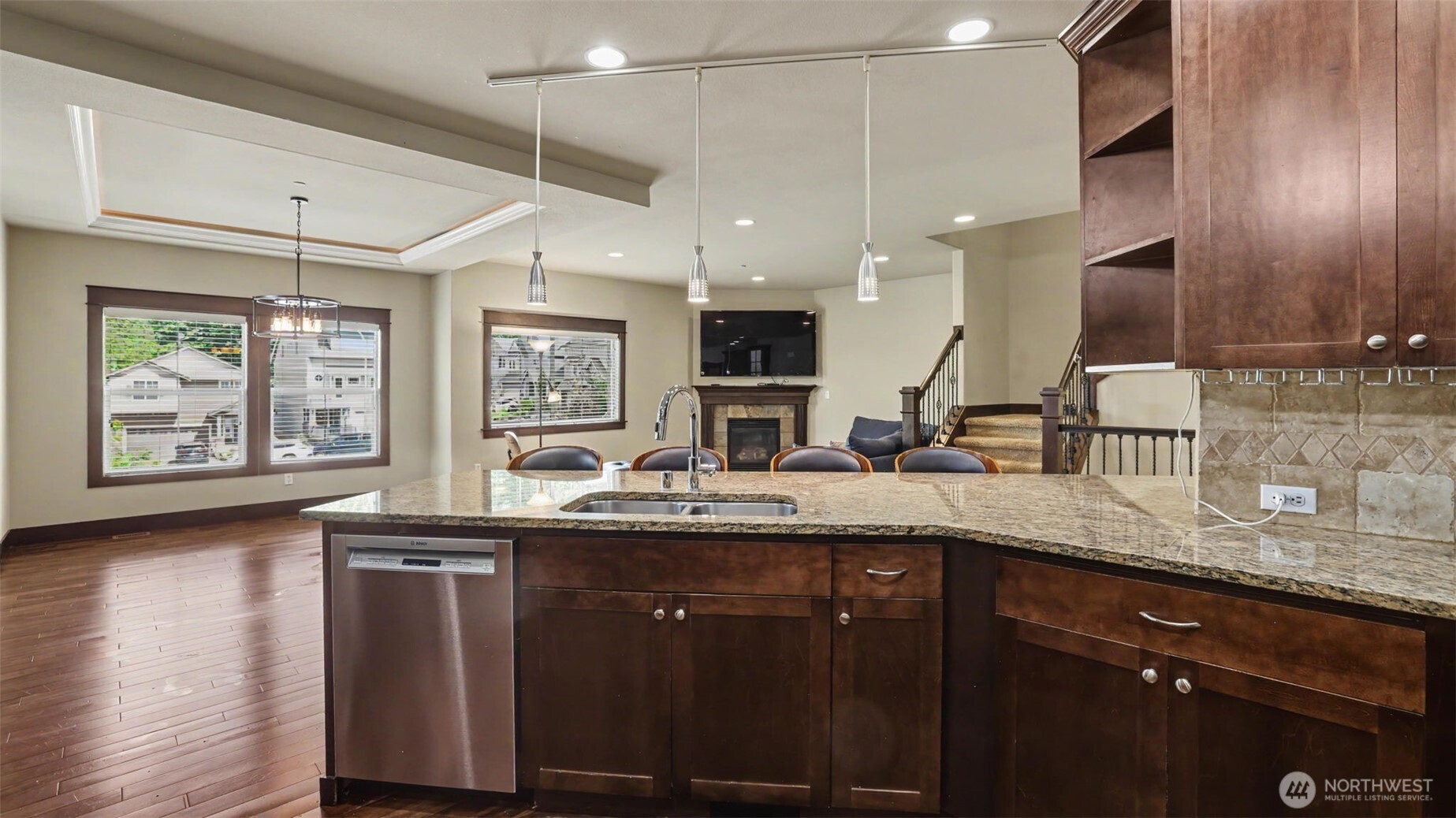 1357 Elma Place Northeast Renton, WA 98059 - Photo 11 of 40 a kitchen with a sink stove and cabinets