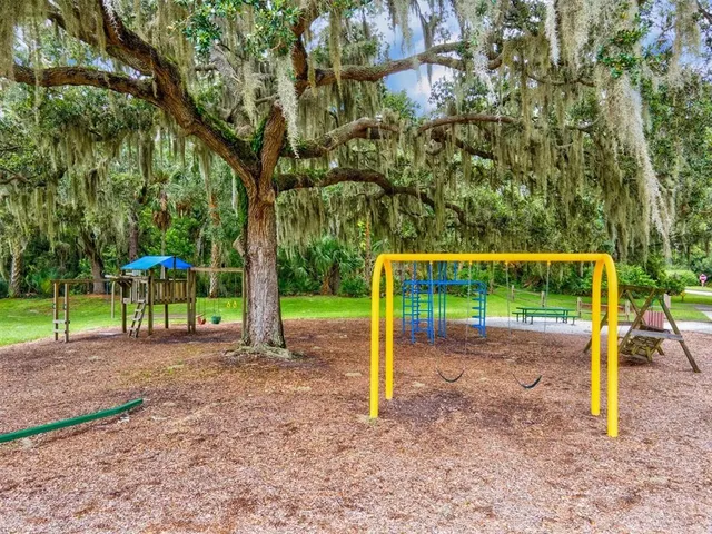a view of a building with sitting area