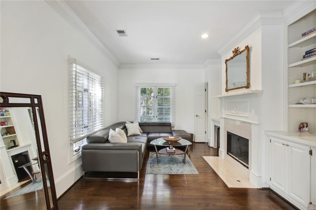 2760 Carmon On Wesley Northwest Atlanta, GA 30327 - Photo 18 of 30 a living room with furniture fireplace and window