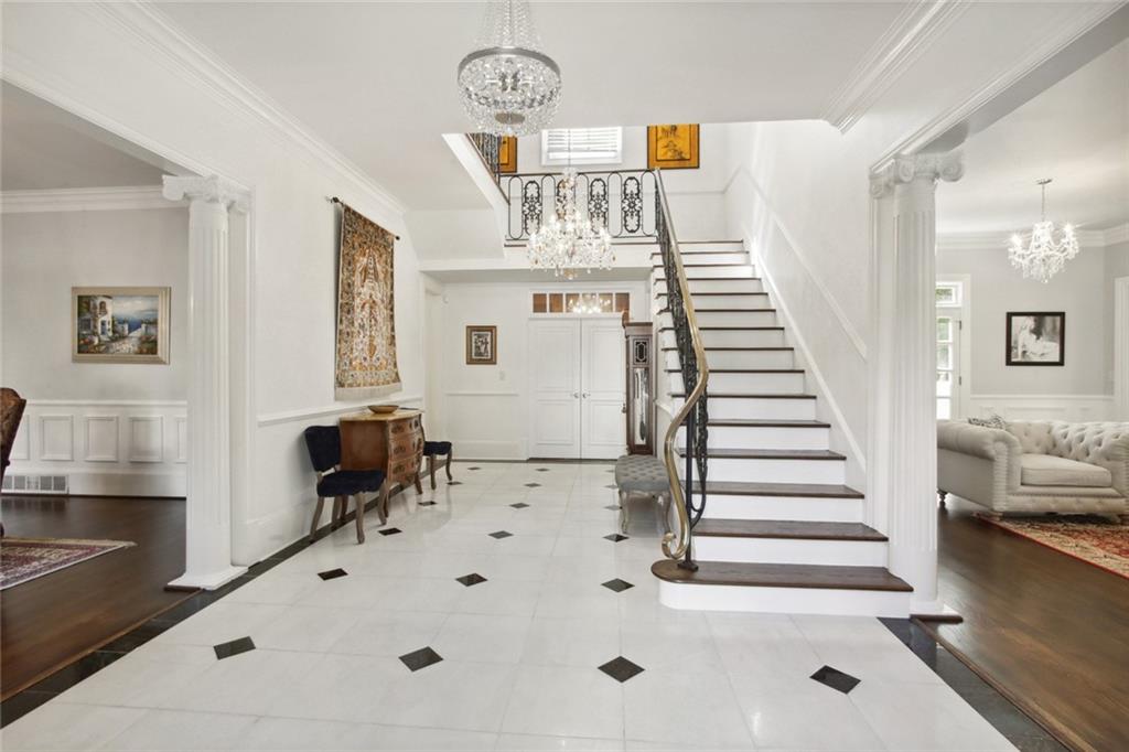 2760 Carmon On Wesley Northwest Atlanta, GA 30327 - Photo 2 of 30 a view of entryway and hall with wooden floor