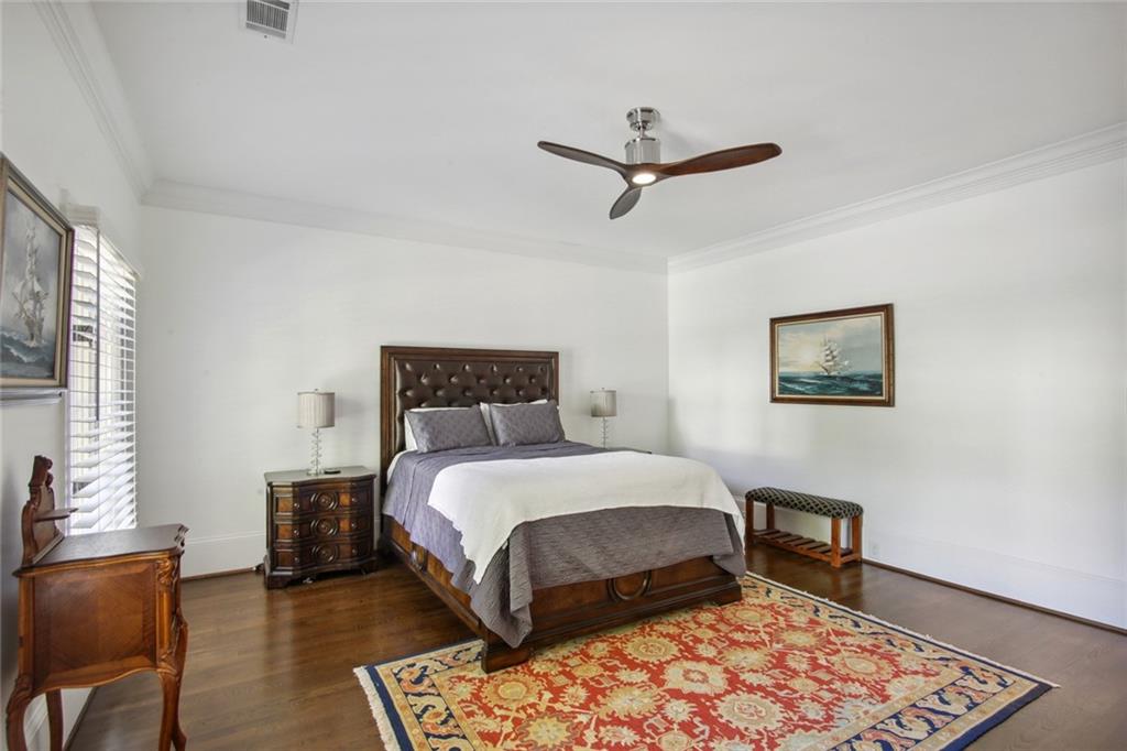 2760 Carmon On Wesley Northwest Atlanta, GA 30327 - Photo 23 of 30 a bedroom with a bed and a chair