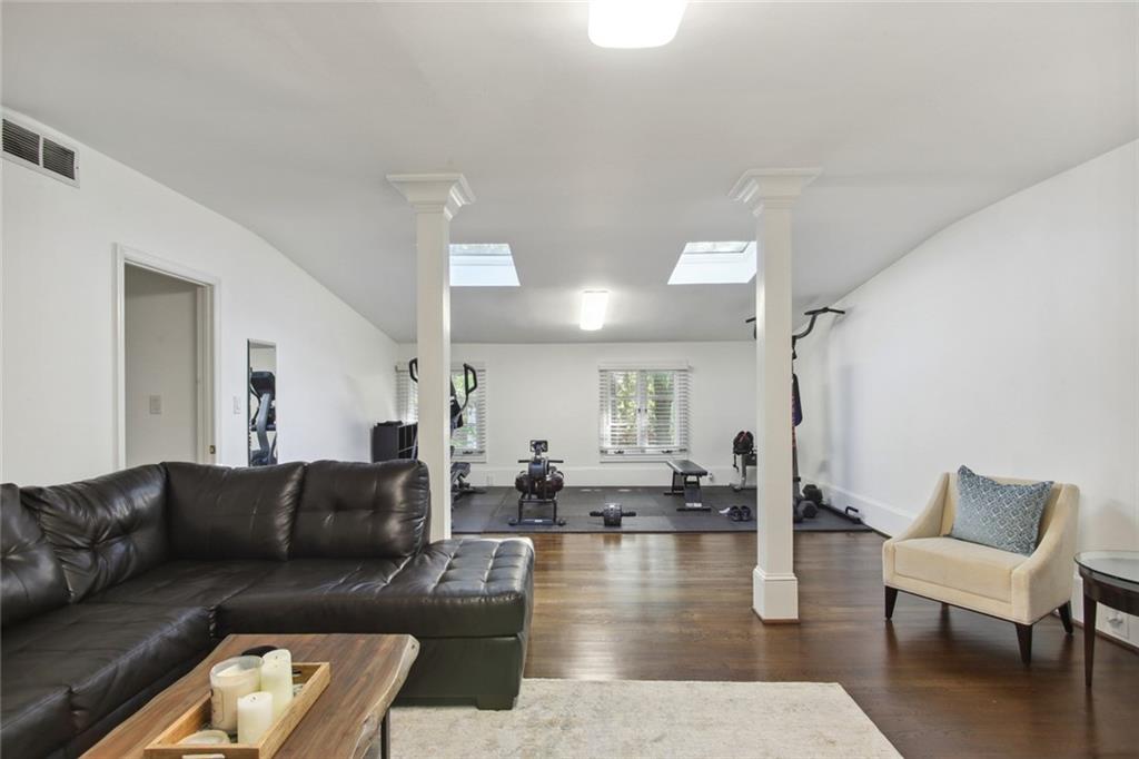 2760 Carmon On Wesley Northwest Atlanta, GA 30327 - Photo 28 of 30 a living room with furniture or couch and a wooden floor