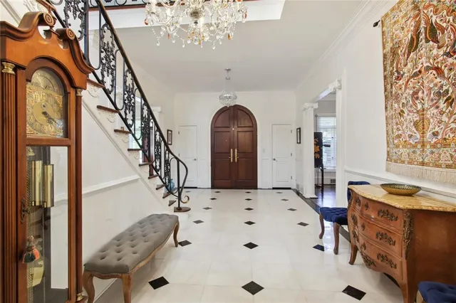 a bedroom with a bed and a large dresser