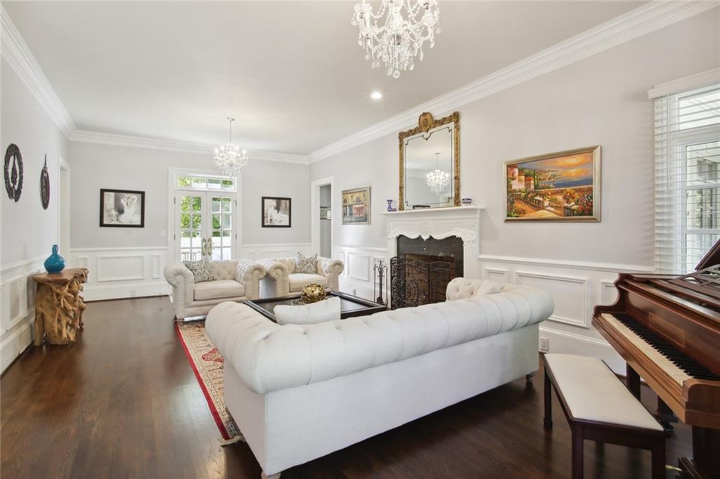 2760 Carmon On Wesley Northwest Atlanta, GA 30327 - Photo 4 of 30 a living room with furniture and a fireplace