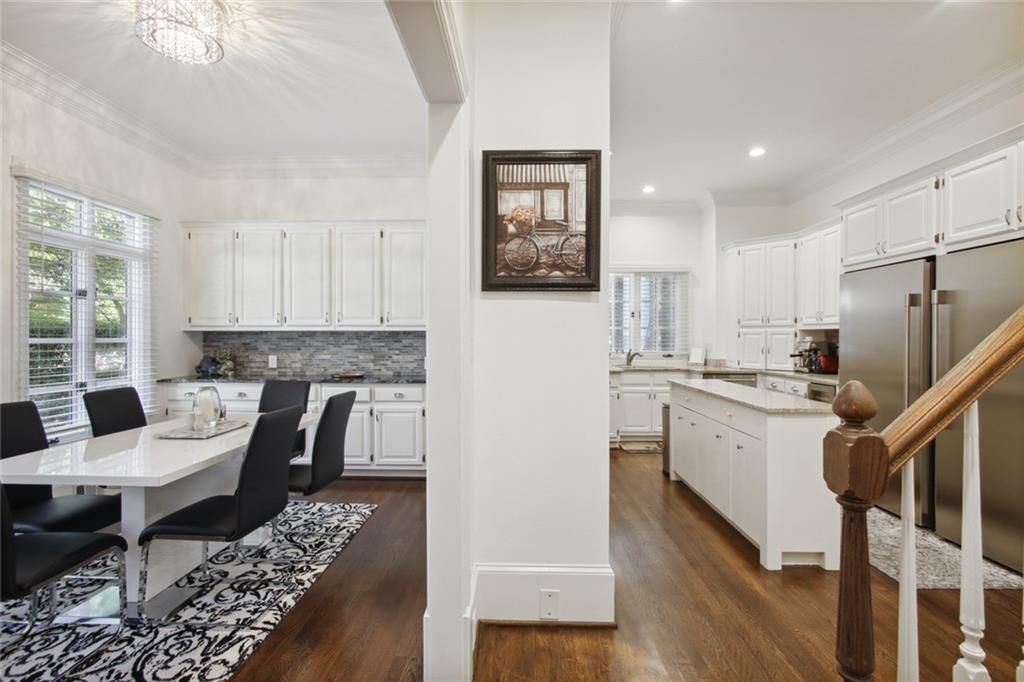 2760 Carmon On Wesley Northwest Atlanta, GA 30327 - Photo 10 of 30 a kitchen with a refrigerator and a stove top oven