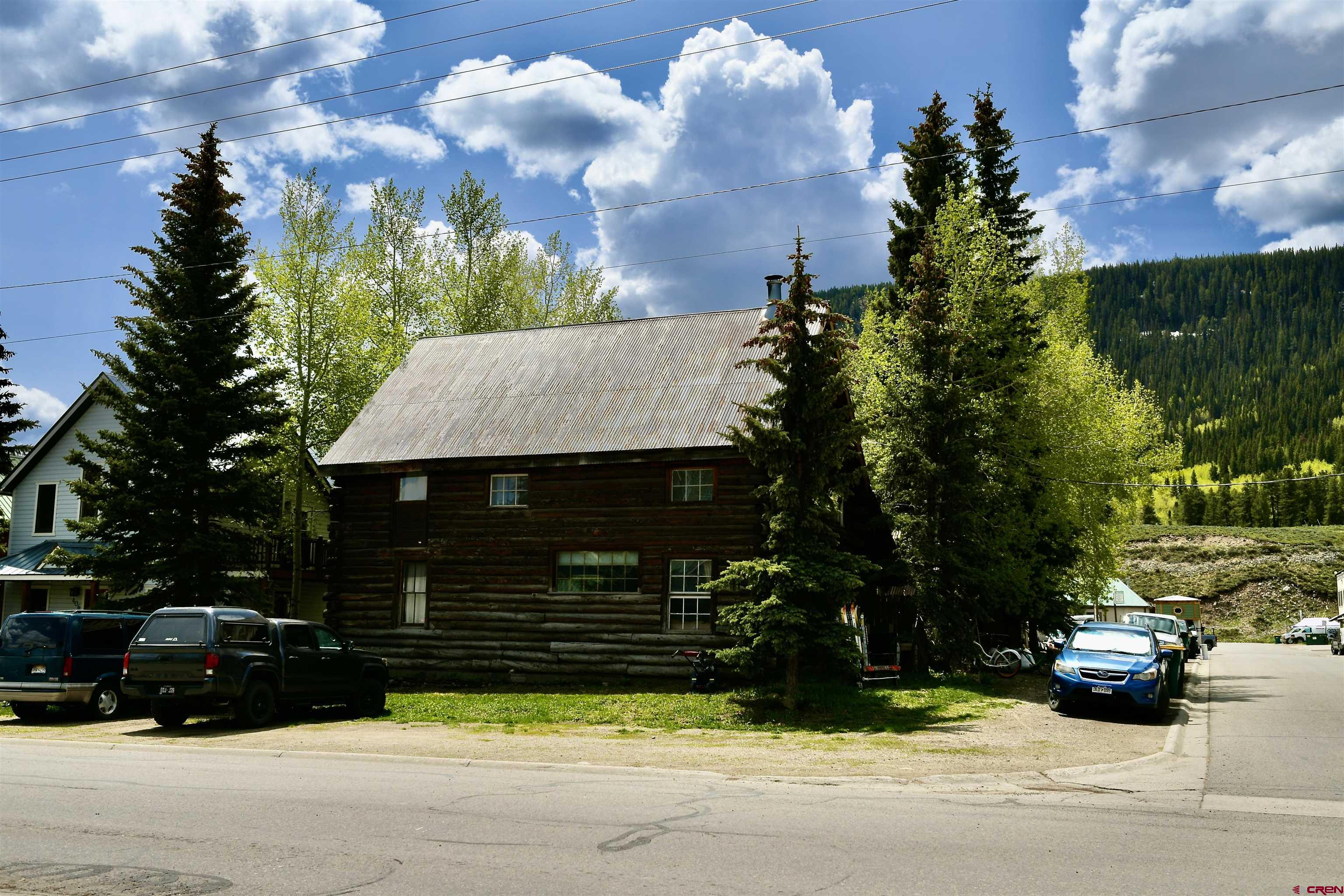602-604 4th Street Crested Butte, CO 81224 - Photo 26 of 45 a view of a house with a yard