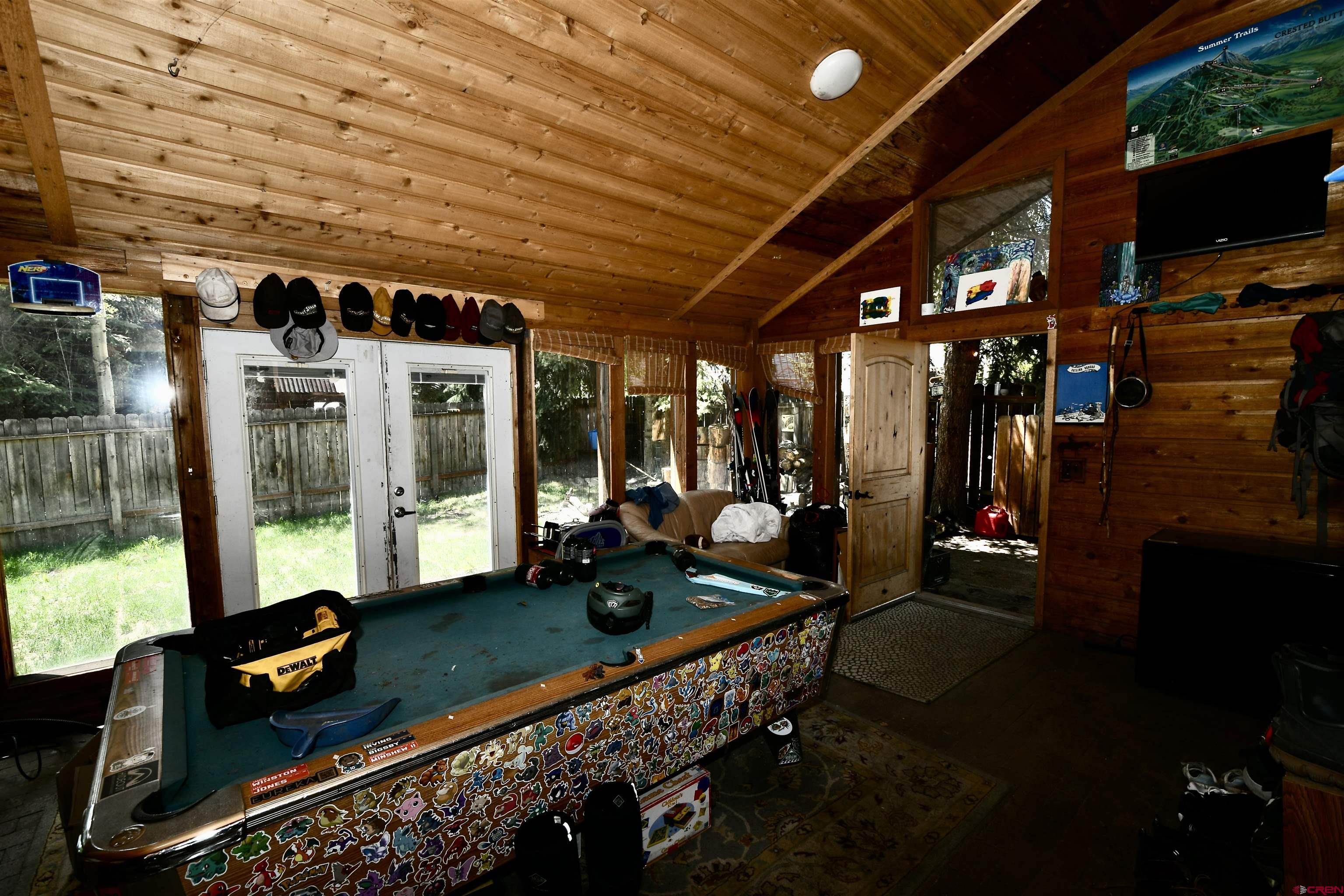 602-604 4th Street Crested Butte, CO 81224 - Photo 31 of 45 a room with lots of furniture and a rug