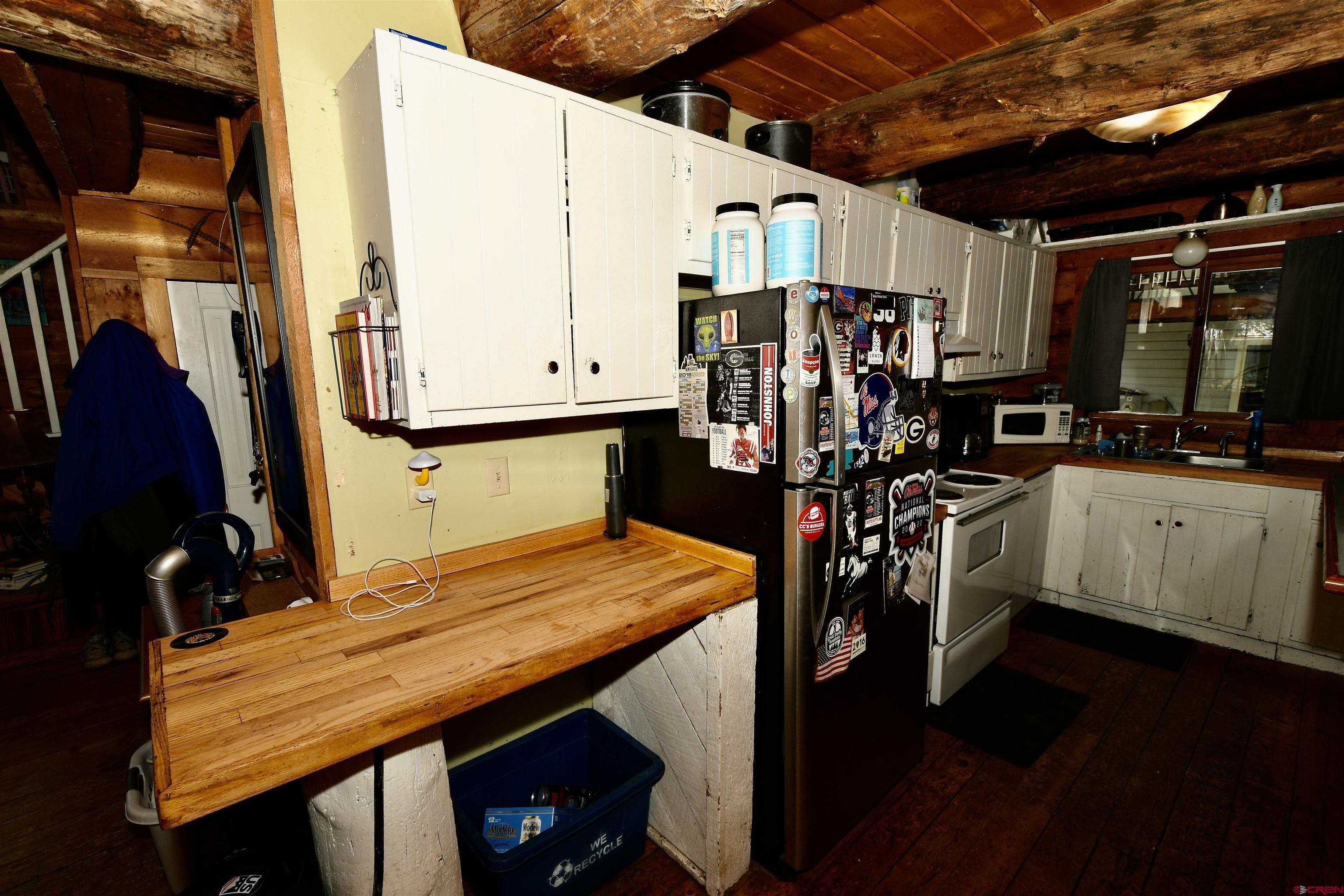 602-604 4th Street Crested Butte, CO 81224 - Photo 44 of 45 a view of a kitchen with appliances and sitting area