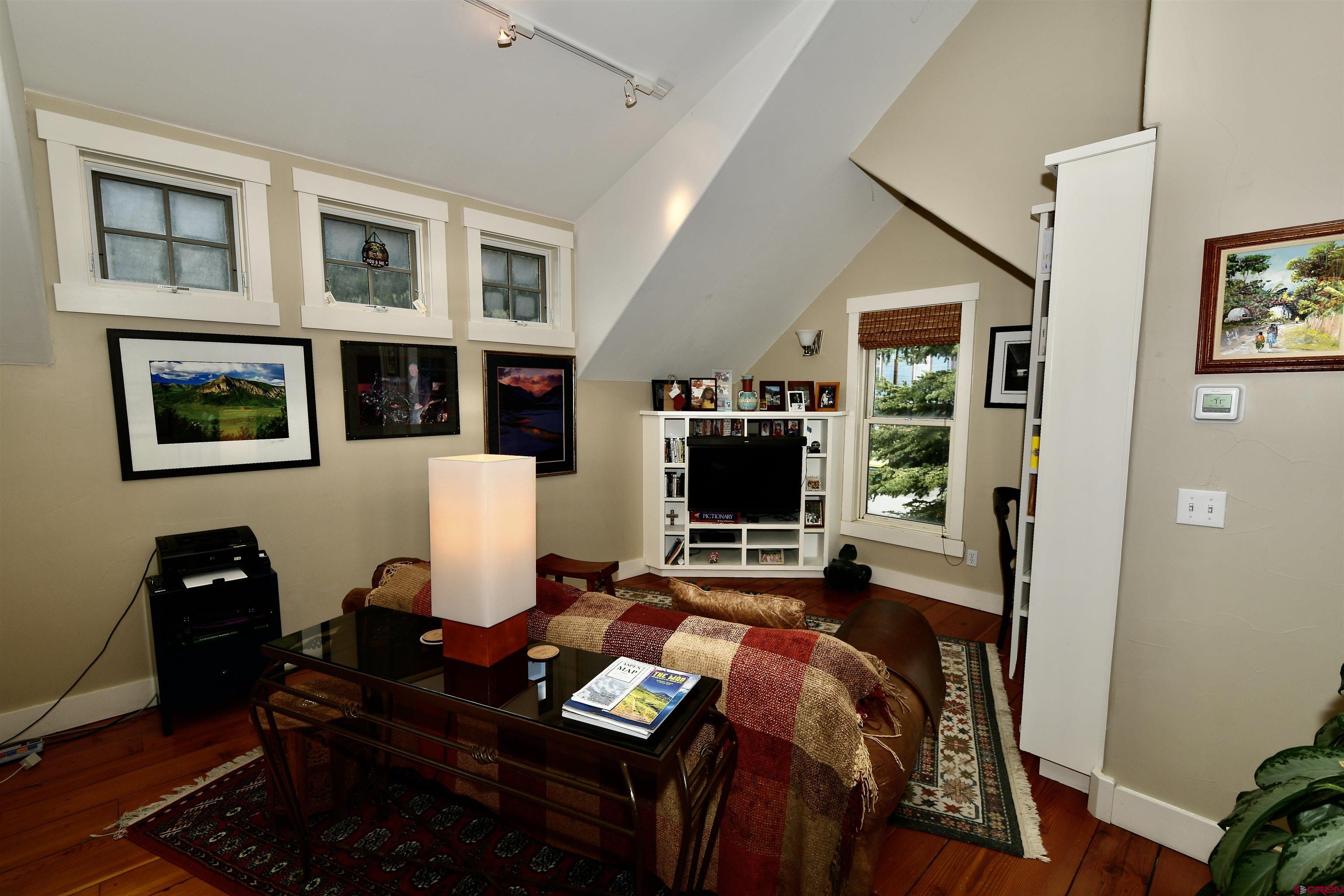 602-604 4th Street Crested Butte, CO 81224 - Photo 7 of 45 a view of a workspace with furniture and a window