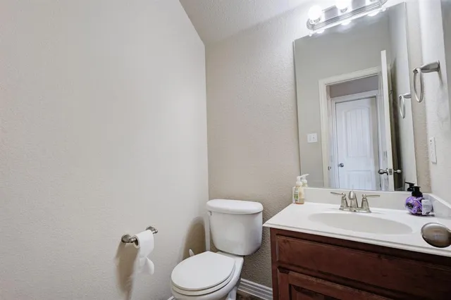 a bathroom with a sink and a toilet