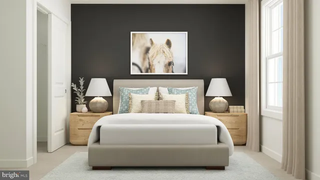 a bedroom with bed and wooden floor