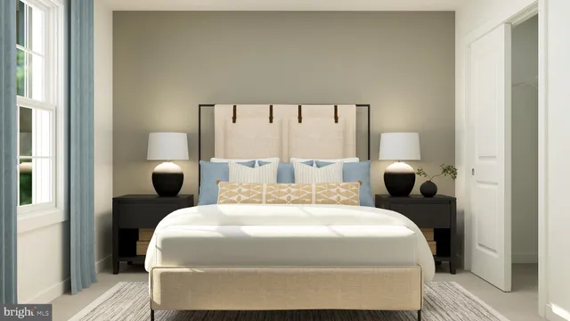 a bedroom with a bed and large windows