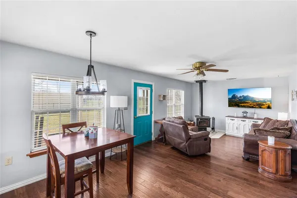 a view of a livingroom with furniture and window