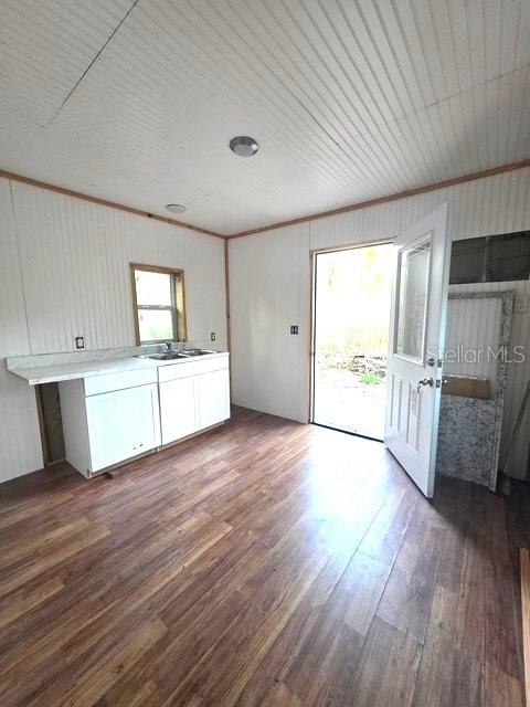 1187 Boston Road Fort White, FL 32038 - Photo 17 of 26 a view of a kitchen with wooden floor electronic appliances and window