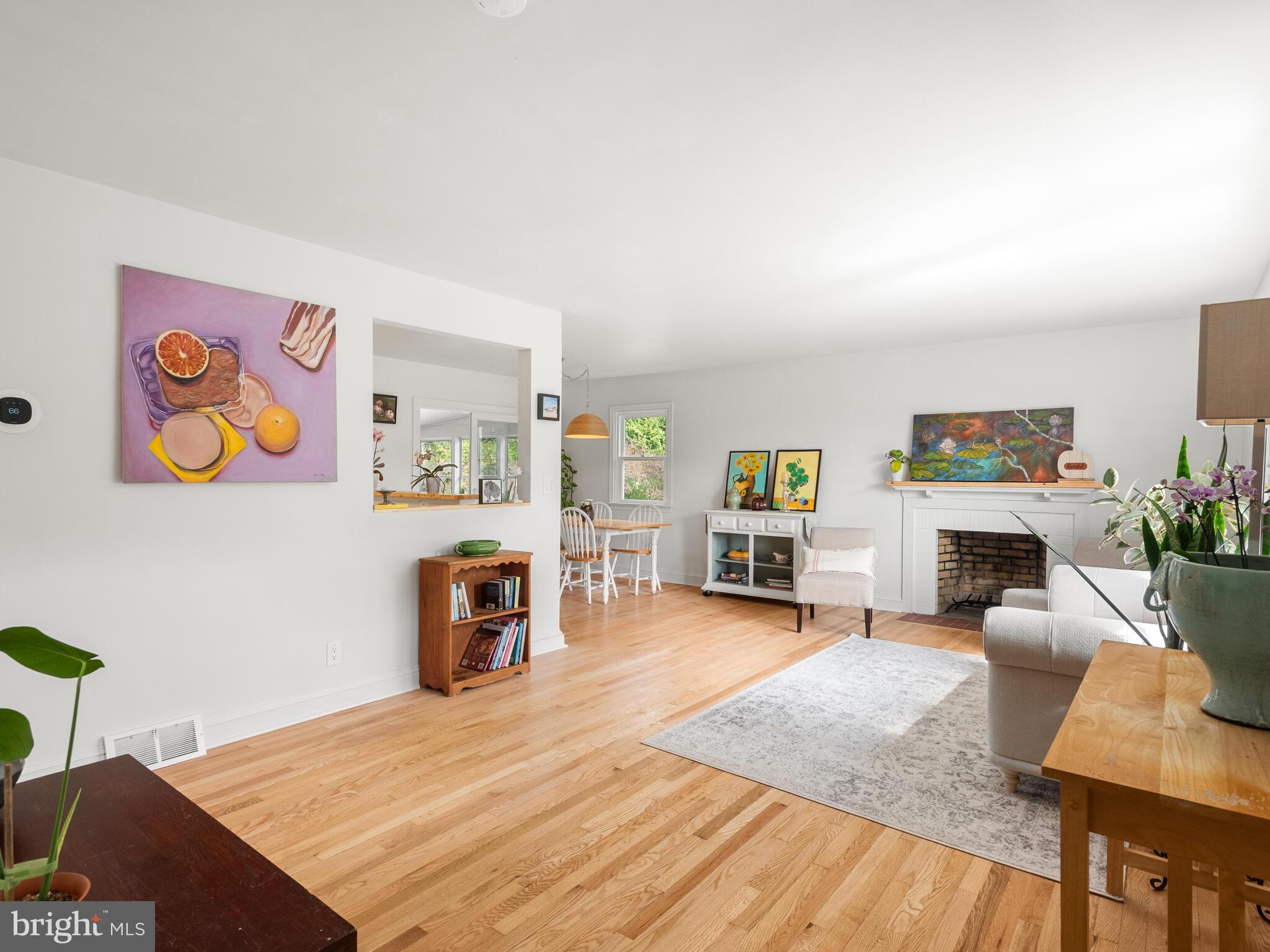 191 West Street Road Kennett Square, PA 19348 - Photo 11 of 41 a living room with furniture and a fireplace