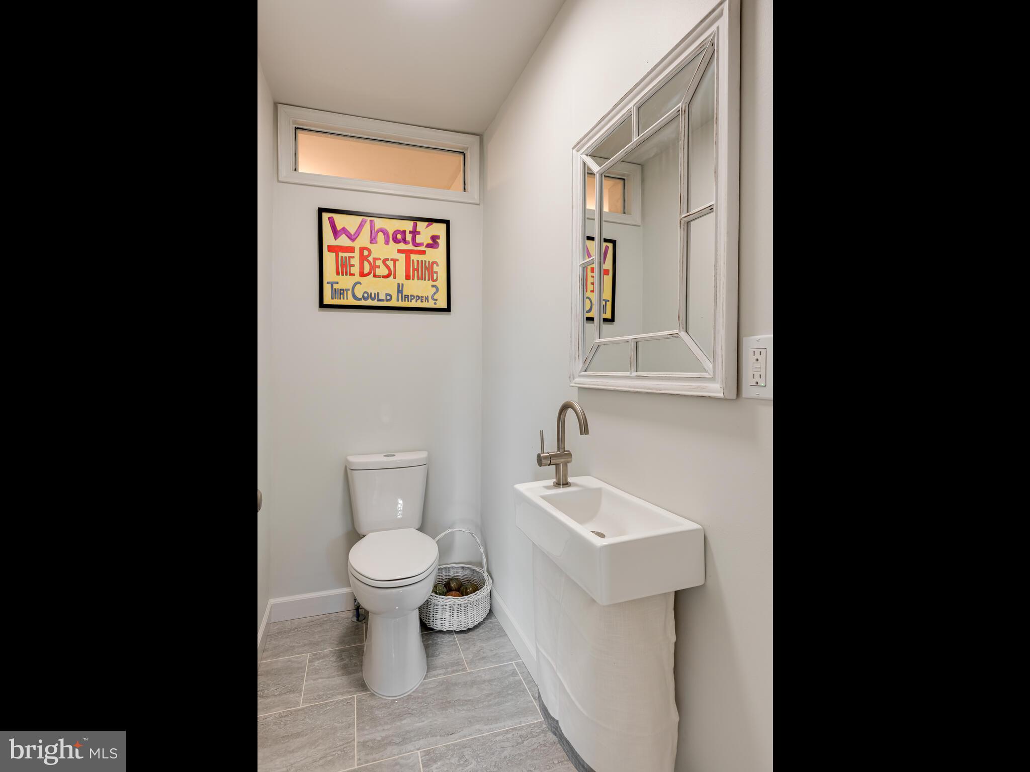 191 West Street Road Kennett Square, PA 19348 - Photo 12 of 41 a bathroom with a toilet a sink and mirror