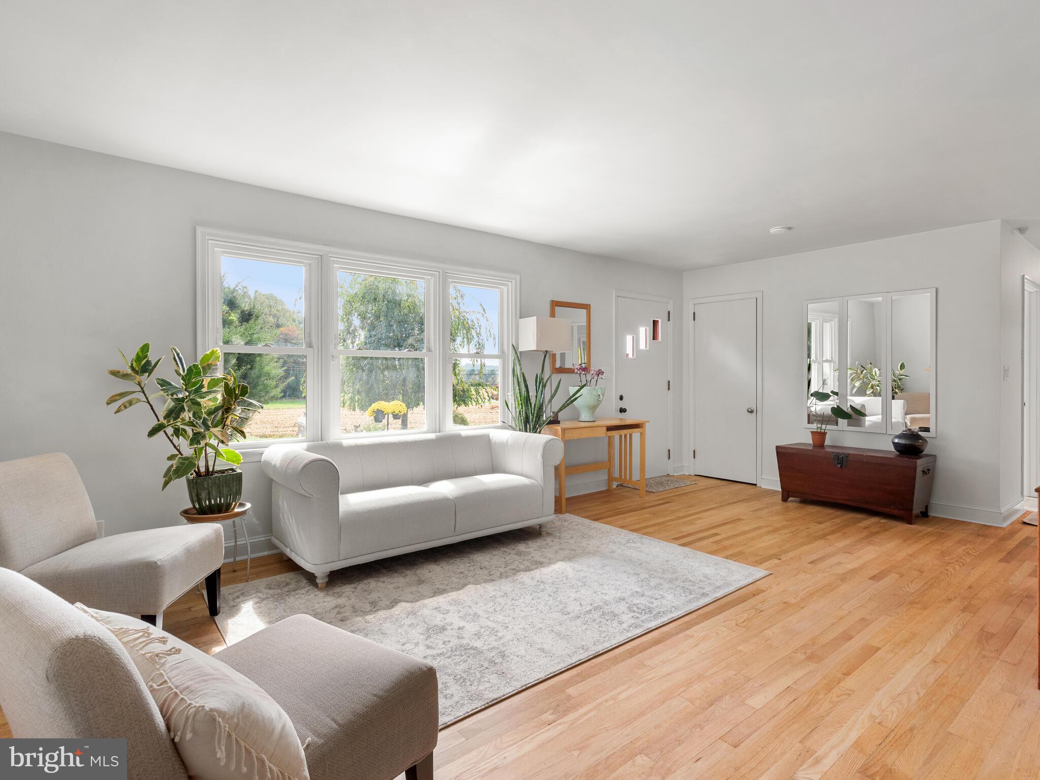 191 West Street Road Kennett Square, PA 19348 - Photo 14 of 41 a living room with furniture and a large window