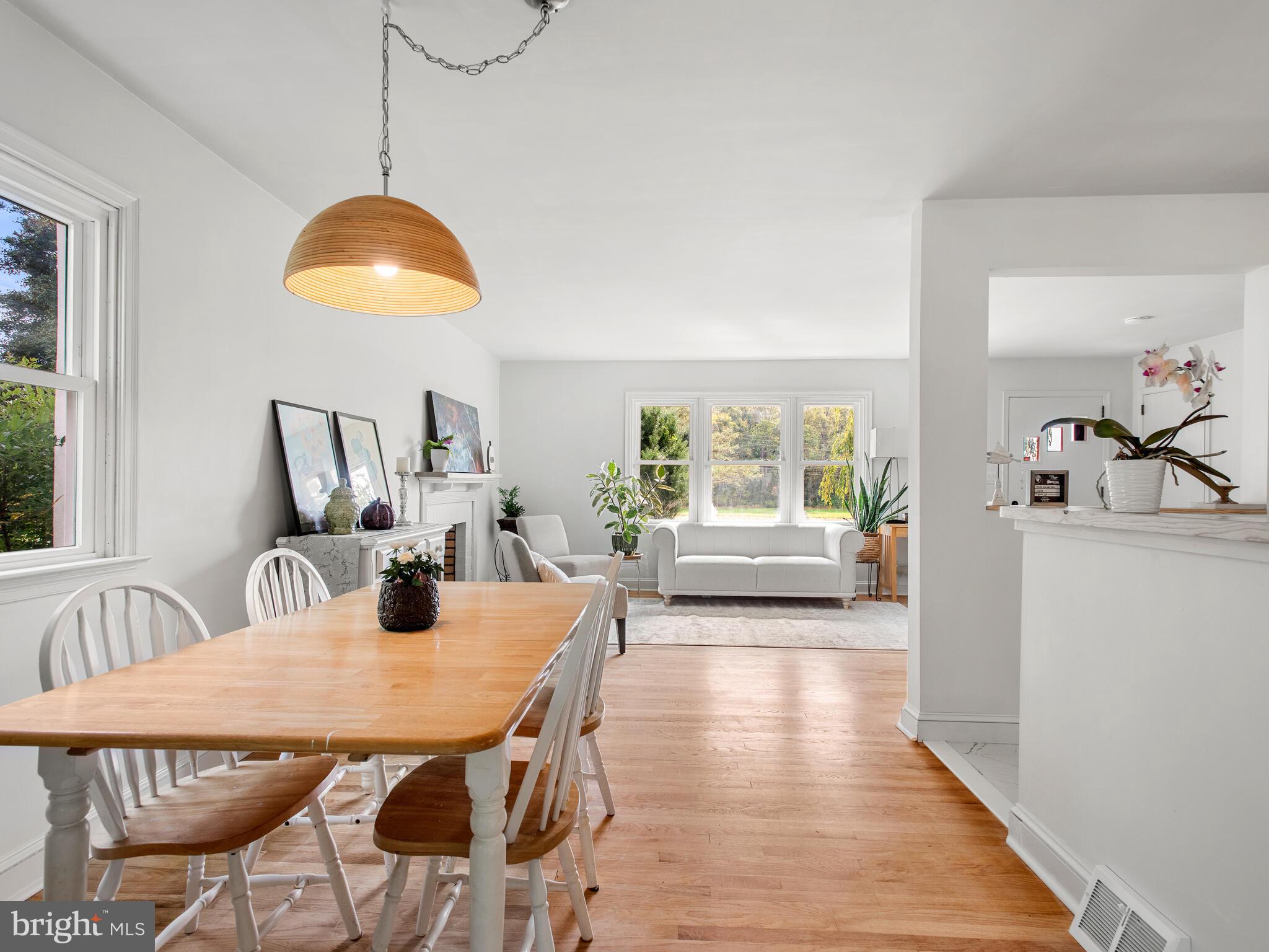 191 West Street Road Kennett Square, PA 19348 - Photo 19 of 41 a view of a dining room with furniture and wooden floor