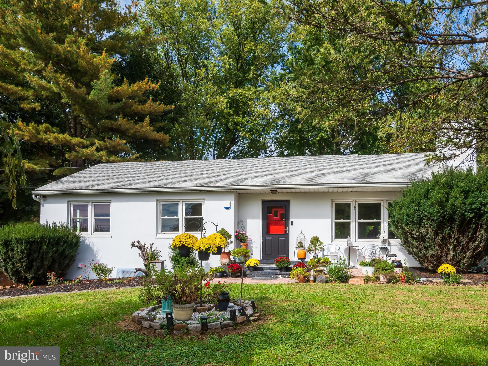 191 West Street Road Kennett Square, PA 19348 - Photo 2 of 41 a view of a house with backyard porch and furniture