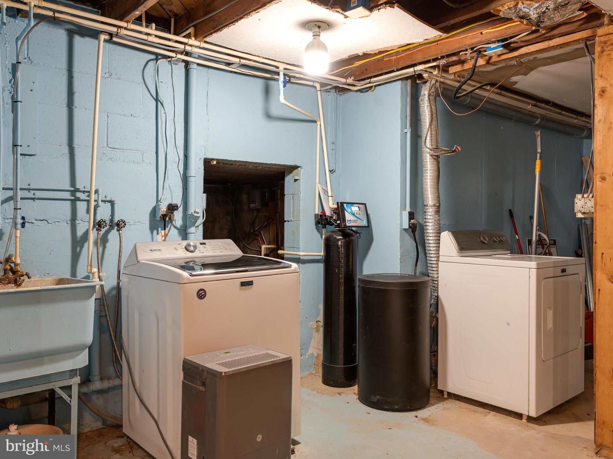 191 West Street Road Kennett Square, PA 19348 - Photo 30 of 41 a view of storage and utility room with two washing machine