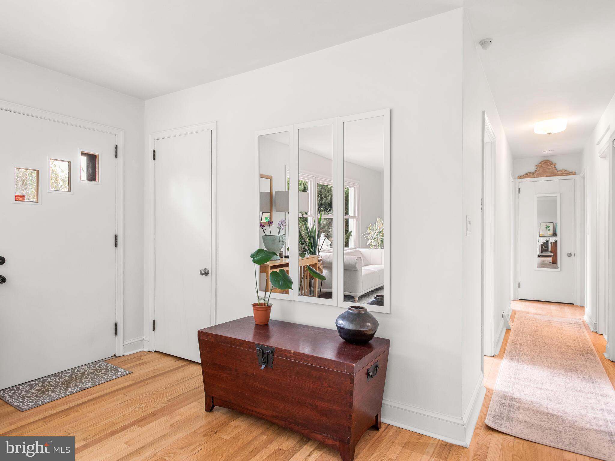 191 West Street Road Kennett Square, PA 19348 - Photo 3 of 41 a view of living room with furniture and wooden floor
