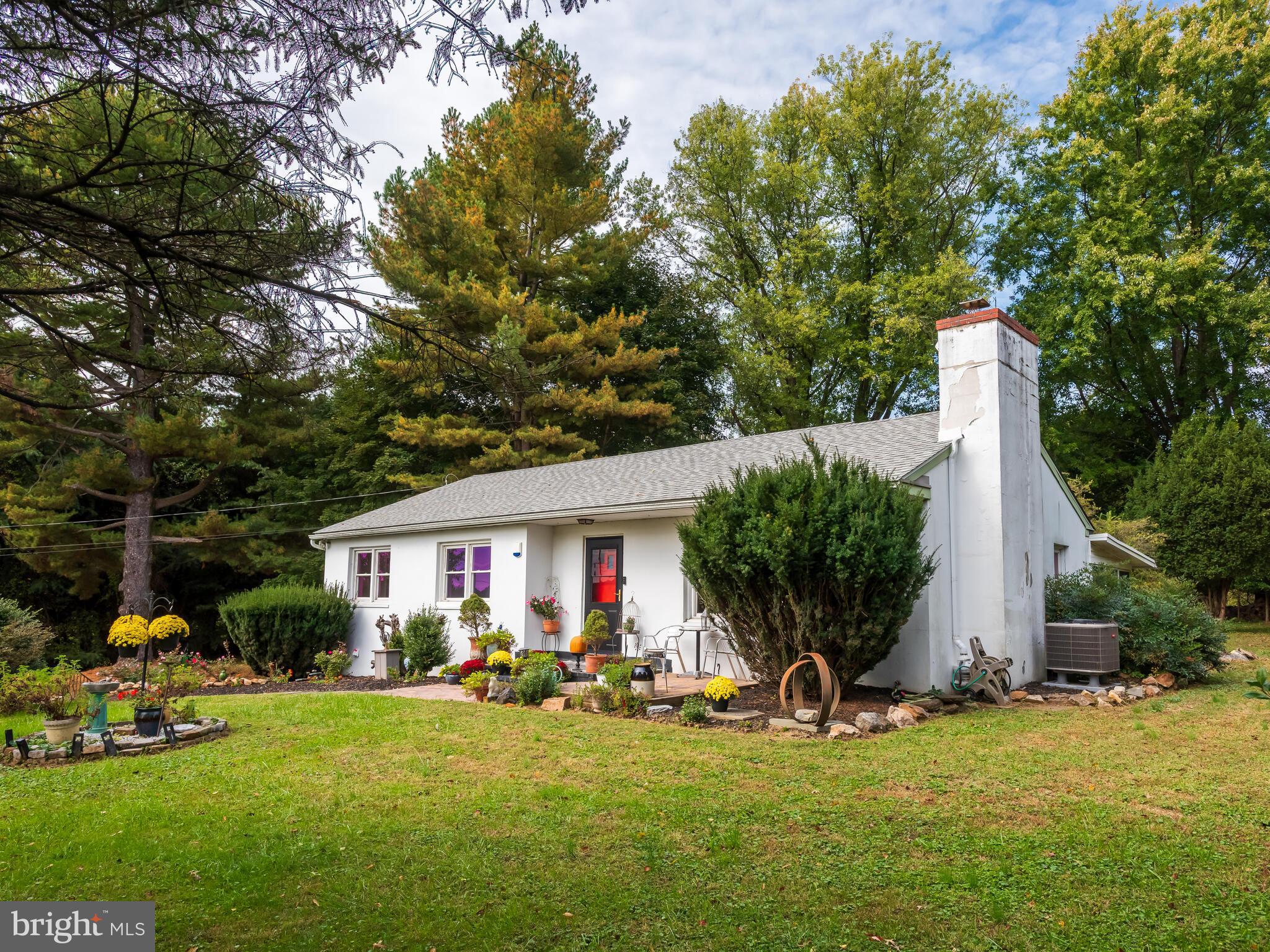 191 West Street Road Kennett Square, PA 19348 - Photo 38 of 41 a view of a house with backyard porch and sitting area