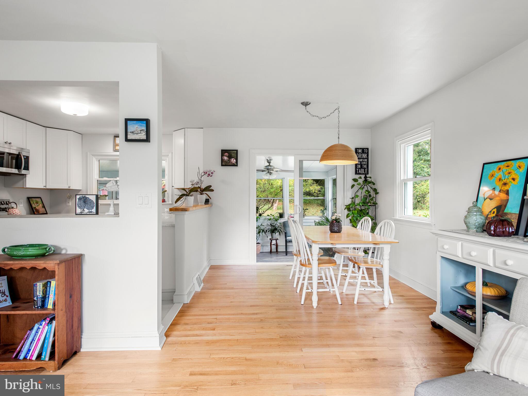 191 West Street Road Kennett Square, PA 19348 - Photo 4 of 41 a view of a dining room with furniture window and wooden floor