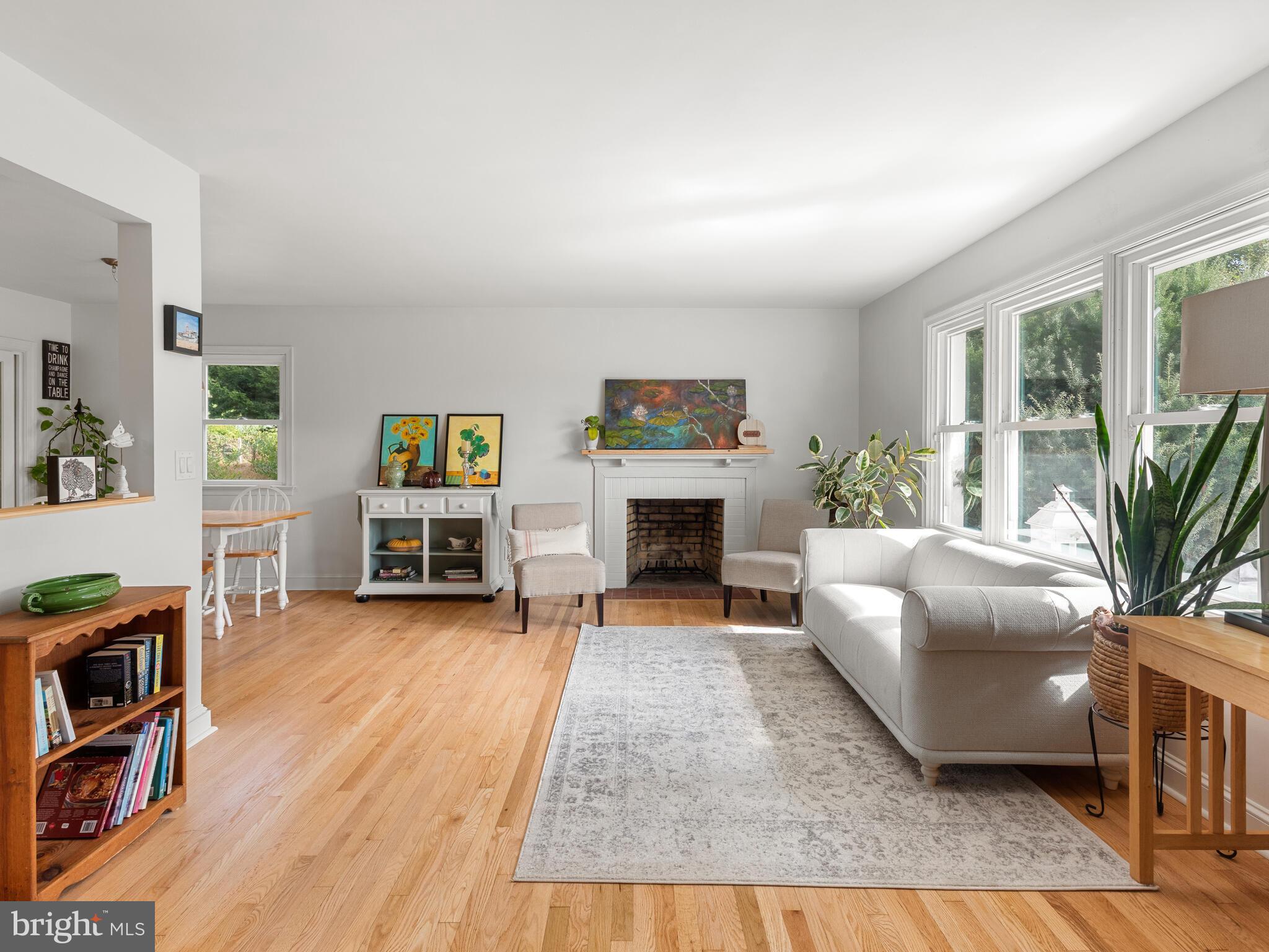 191 West Street Road Kennett Square, PA 19348 - Photo 10 of 41 a living room with furniture and a fireplace