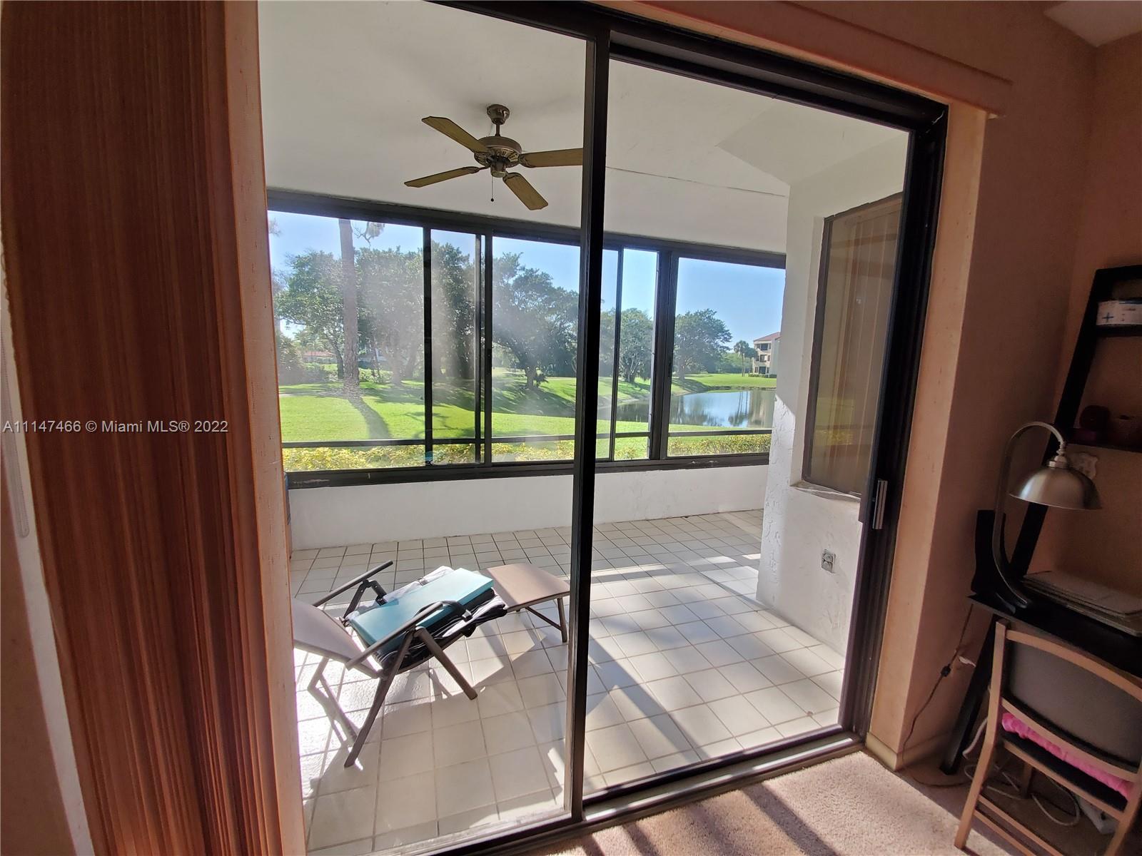 7472 La Paz Boulevard, Unit 104 Boca Raton, FL 33433 - Photo 40 of 44 a view of a room with a porch