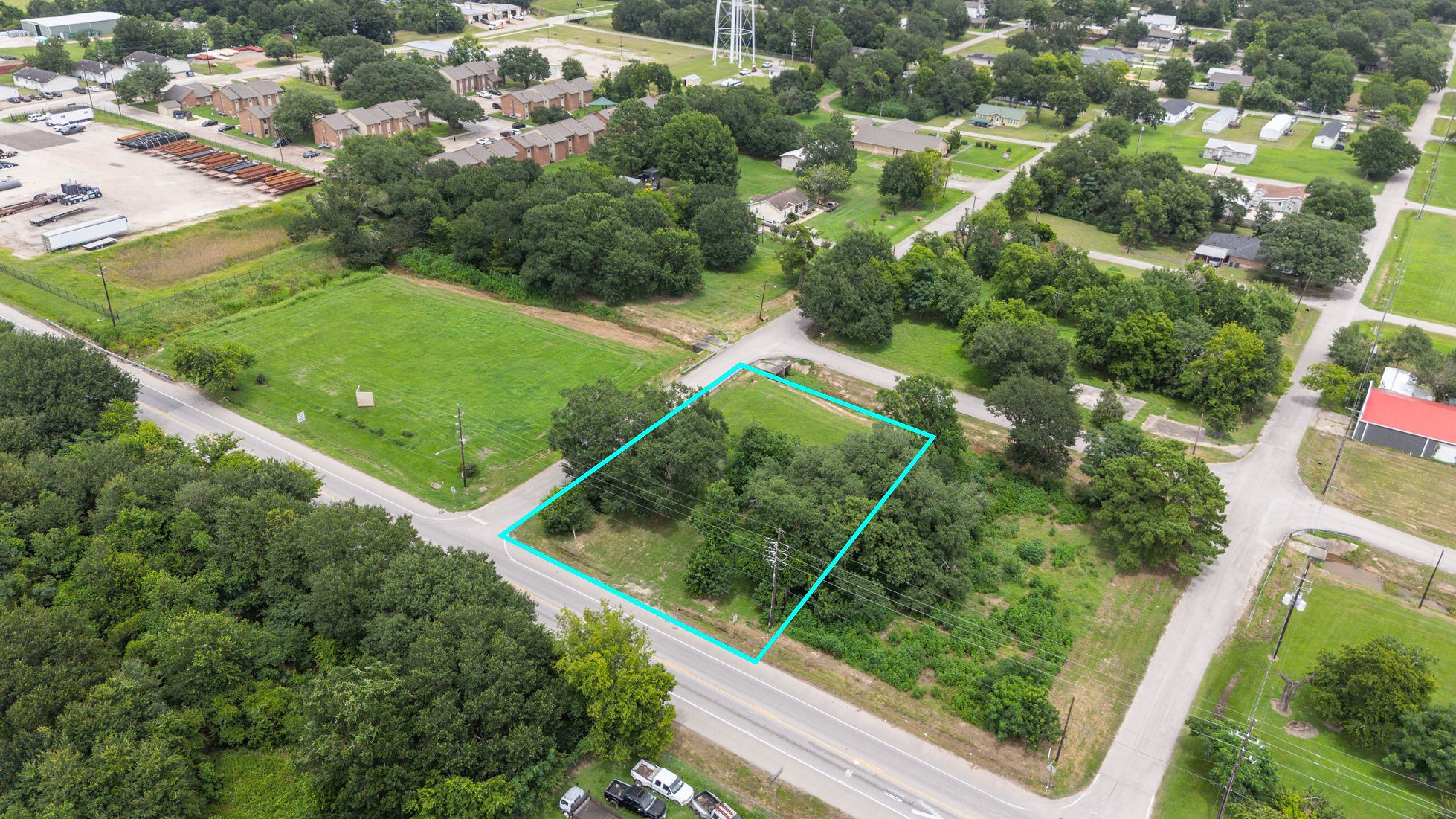0 Sledge Street Waller, TX 77484 - Photo 6 of 13 an aerial view of a residential houses with outdoor space and street view