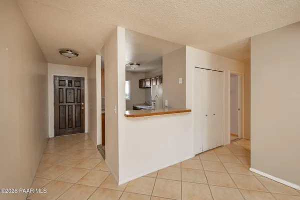 a kitchen that has a sink a stove and oven
