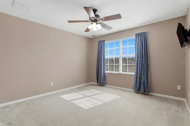 a view of a livingroom with a flat screen tv