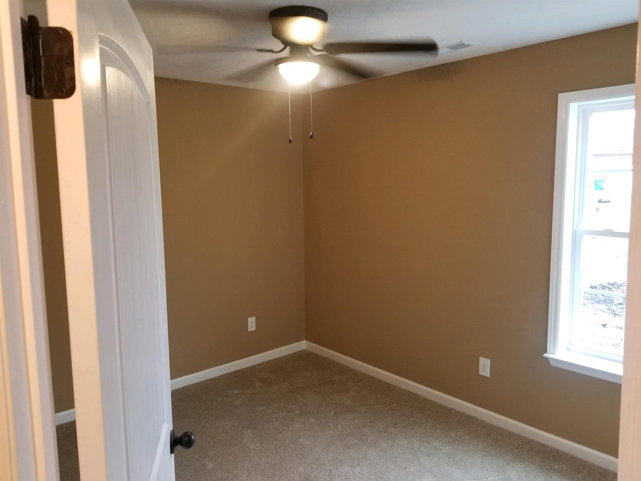 320 Oak Hollow Road Manchester, TN 37355 - Photo 7 of 9 a view of an empty room with a window