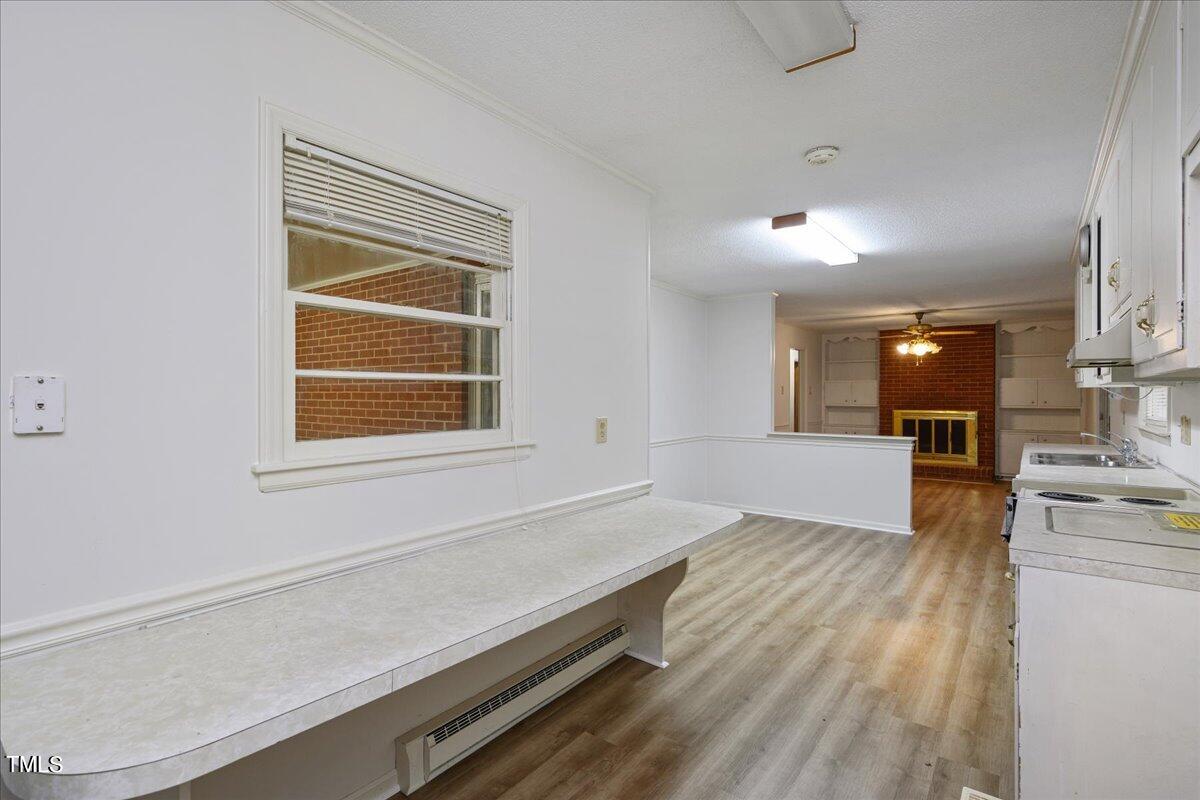 155 Barclay Road Durham, NC 27712 - Photo 20 of 23 a view of kitchen with sink and wooden floor