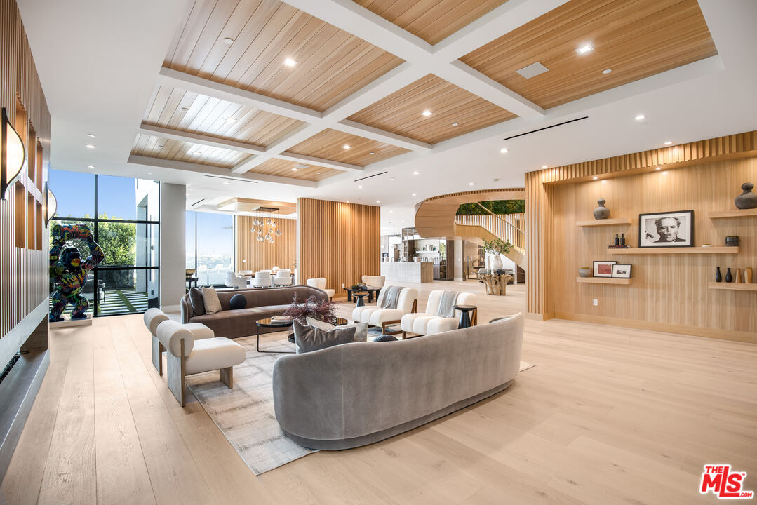 1033 Somera Road Los Angeles, CA 90077 - Photo 20 of 72 a living room with furniture and a large window