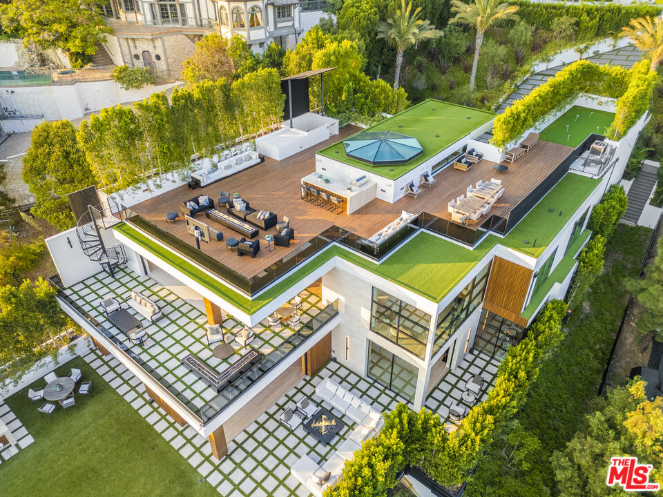 1033 Somera Road Los Angeles, CA 90077 - Photo 2 of 72 an aerial view of a pool