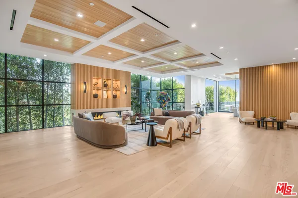 a view of a chairs and table in the patio