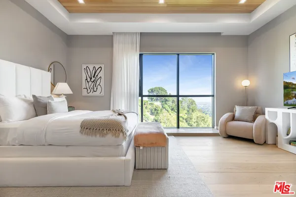 a view of a chairs and table in the patio