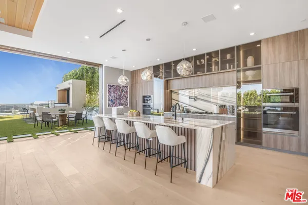 a view of a cafe with sitting area